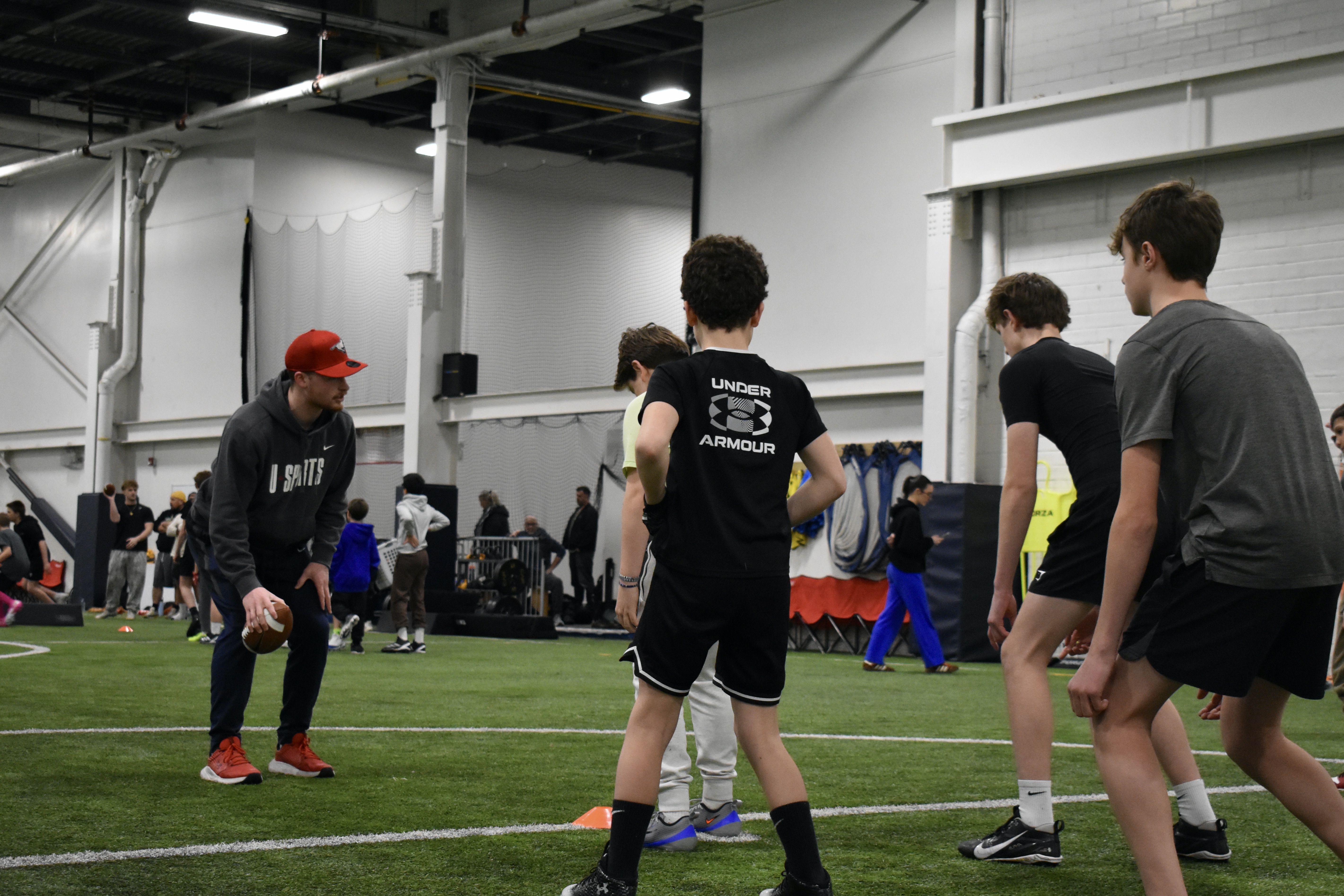 Guest coach Ashton Miller-Melancon Calgary Stampeders KMFL winter camp